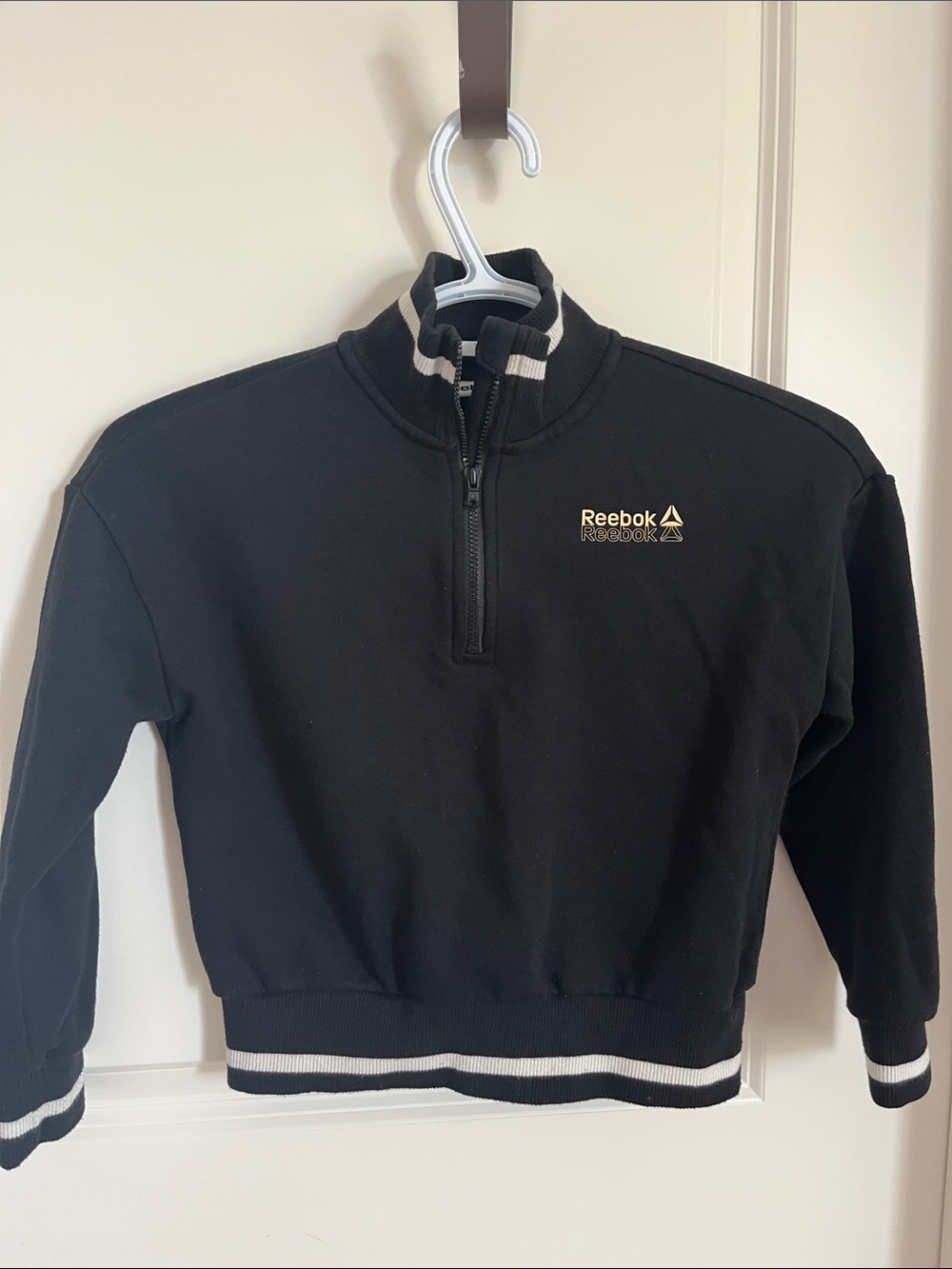 Reebok Black Half-Zip Pullover with White Trim and Gold Logo